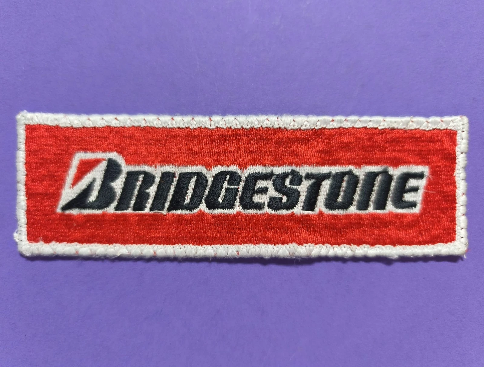 alter Textil Aufnäher, Bridgestone, Reifen, Motorsport, 4,5 x 14 cm